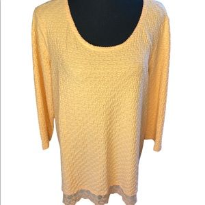 Bright pastel orange top